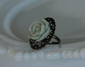 Soft Blue Open Rose Oval Filigree Ring -- Antique Brass