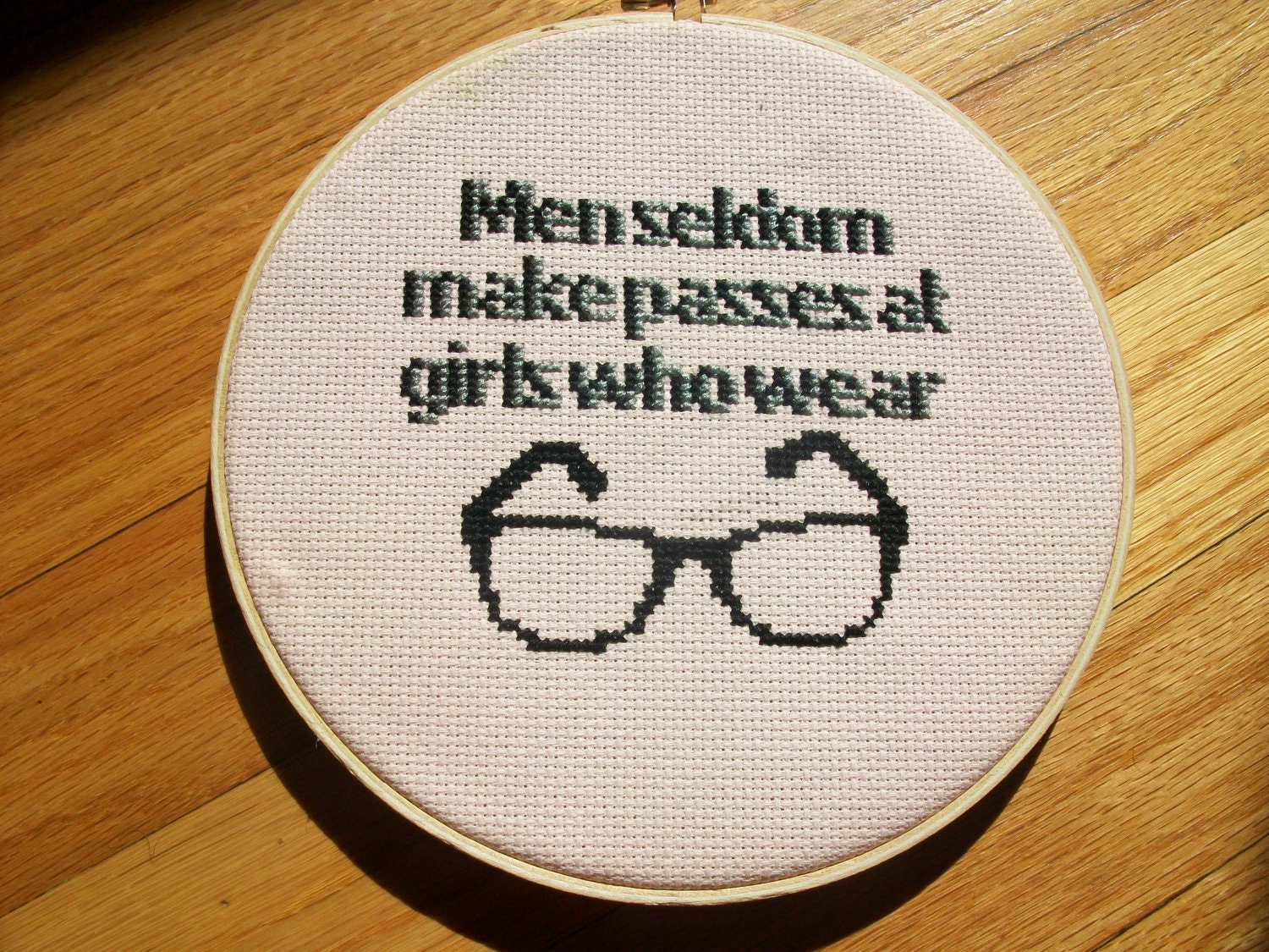 Completed Framed Cross Stitch -Dorothy Parker "Men seldom make passes at girls who wear glasses"