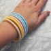 Set of six thin flat pretty pastel bangles