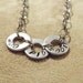 Woo Pig Sooie Stamped washer bracelet/ metal chain bracelet