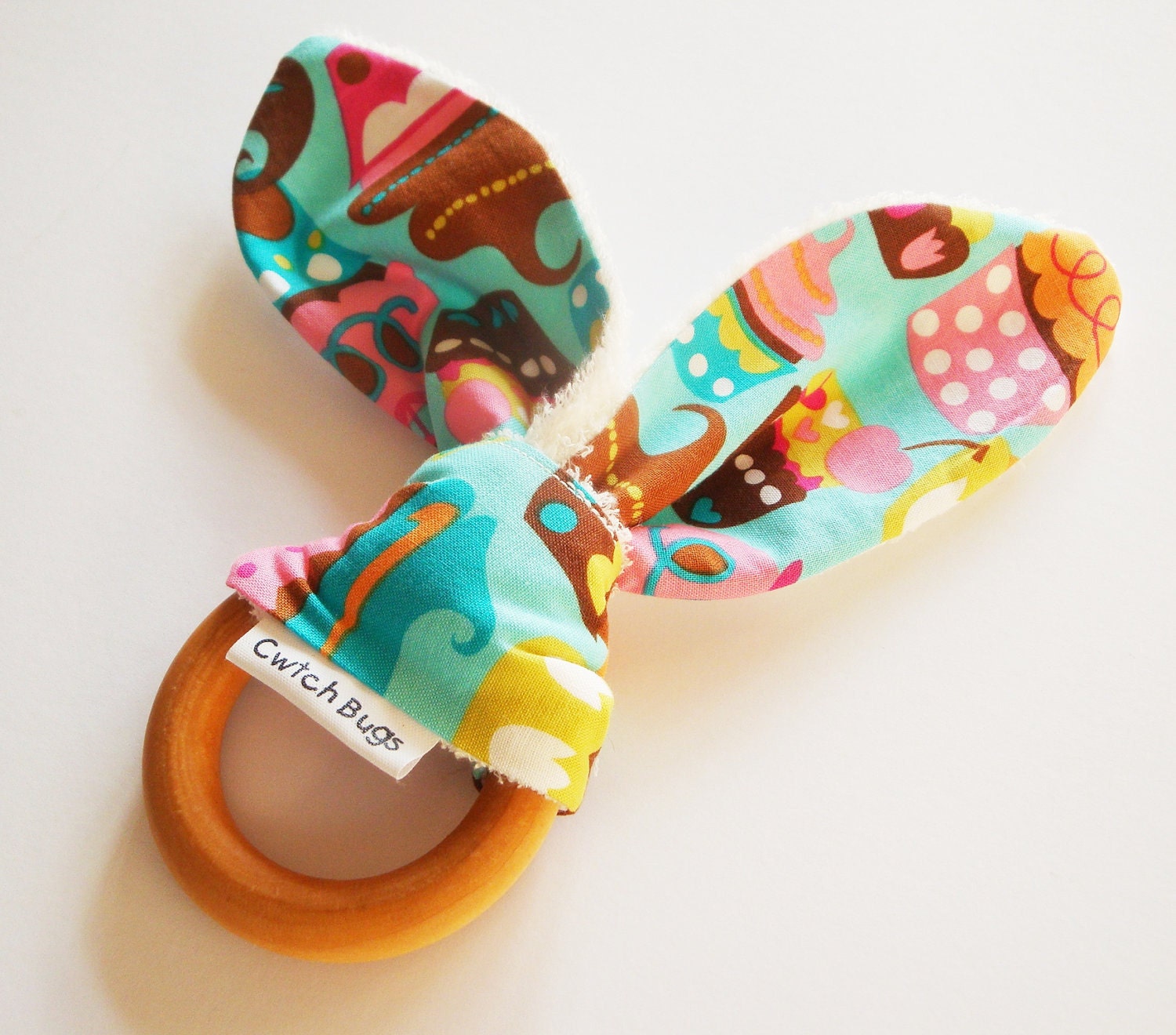 Natural Wooden Teething Ring Soother in SWEET TREATS fabric and Bamboo Terry....another baby gift idea from Cwtch Bugs