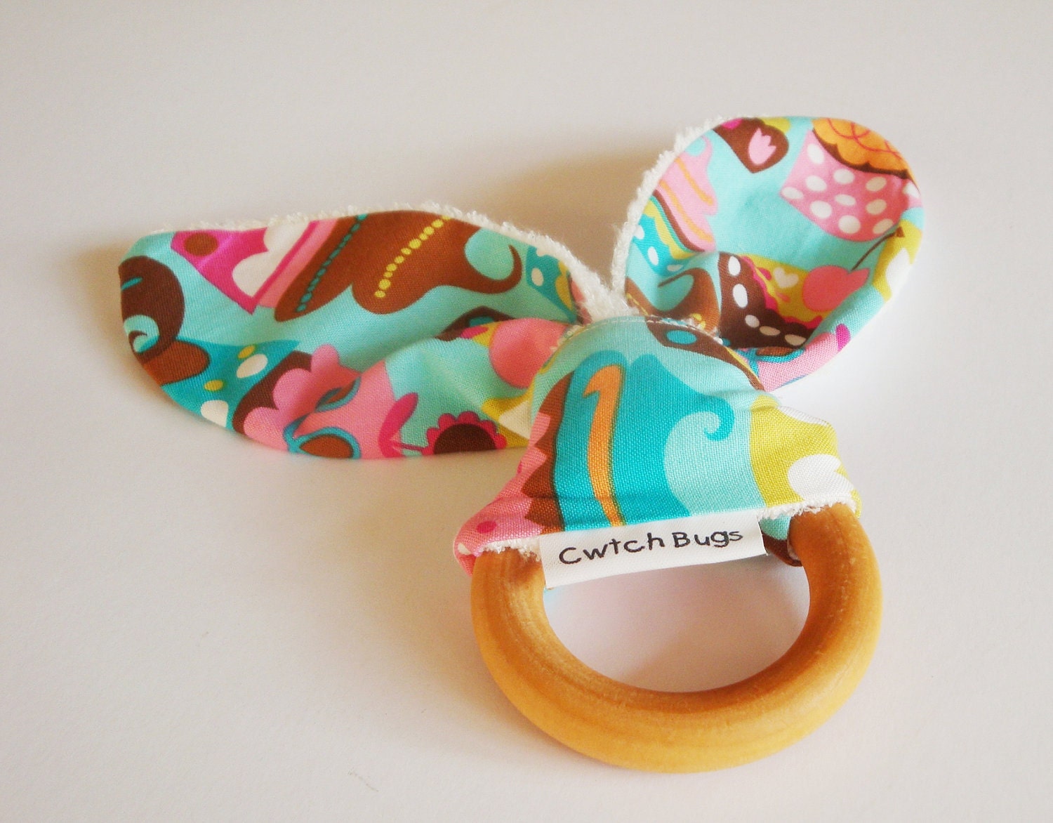 Natural Wooden Teething Ring Soother in SWEET TREATS fabric and Bamboo Terry....another baby gift idea from Cwtch Bugs