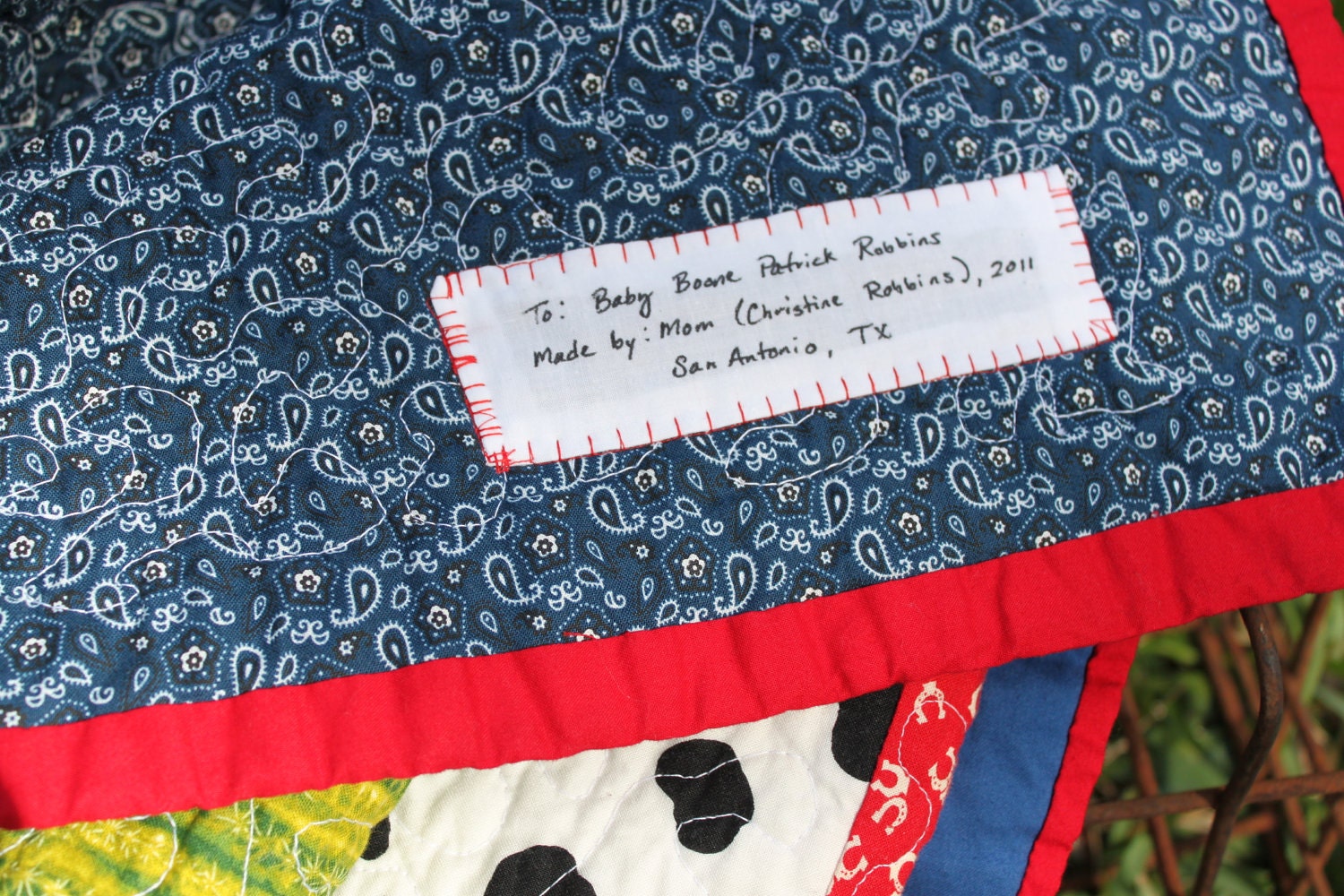 ChristmasInJuly Boy's Cowboy Quilt, crib/toddler size, Rodeo scrappy strip blanket with appliqued cowboy boot, OOAK