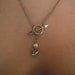 The Hunger Games - Katniss Mockingjay Pin Silver Archery Necklace with Peeta's Pearl - Lariat
