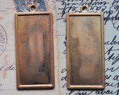 TWO Vintage tall and skinny tags with natural discoloration