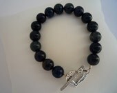 Dumortierite semiprecious stones  bracelet  with  sterling silver heart toglle clasp.