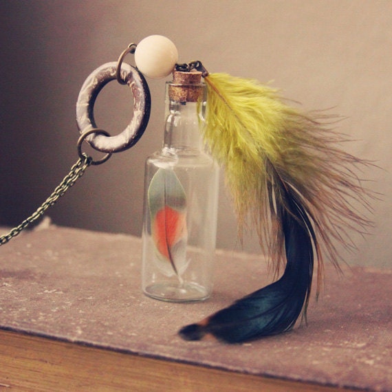 farrah. a colorful feather in a bottle gypsy necklace.