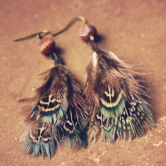 RESERVE FOR JULIE skye. a pair of soft teal feathered earrings.