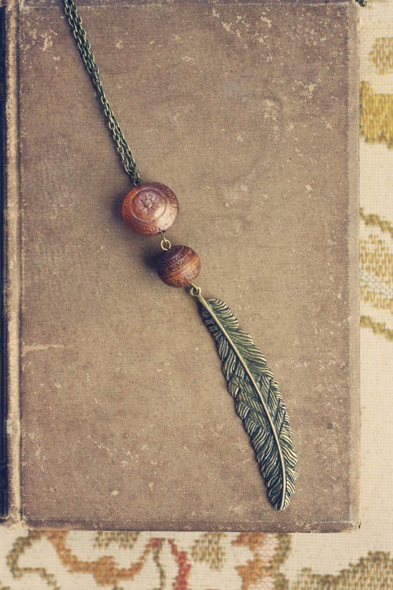 bellarosa. a long feminine peach and brown feather necklace.