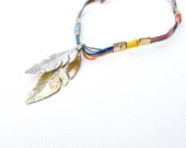 Upcycled Feather Charm Neckpiece (made from tin can, bottle caps, electrical wire)