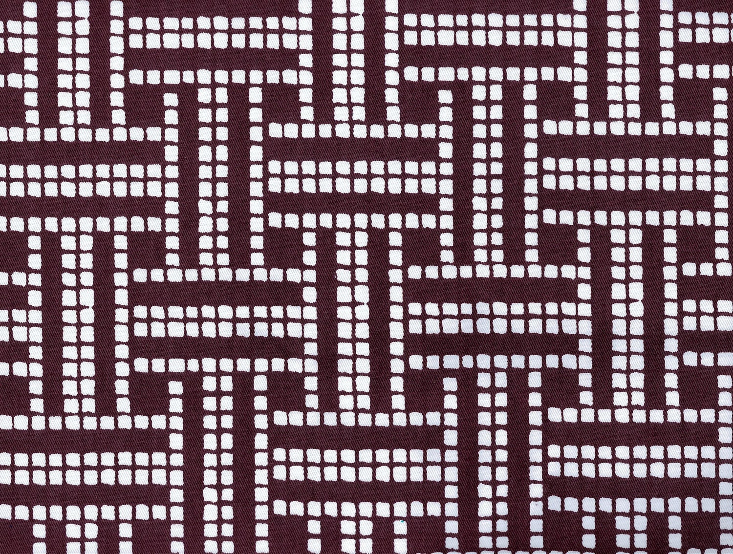 Truffle 100% organic cotton twill, 7 oz.  Brown screenprinted design on fabric yardage