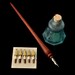 Calligraphy, pen and ink, hand turned blood wood dip pen and antique ink bottle, with nibs.