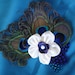 Bridal ivory peacock feather hair piece, ivory purple satin flower accented with ivory freshwater pearl