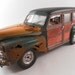 1940s Ford Woody 1/24 scale model car in green