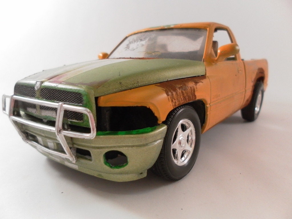 Dodge Ram 1/24 scale model truck in yellow