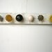 Hanging Jewelry Organizer with Yellow and Gray Knobs