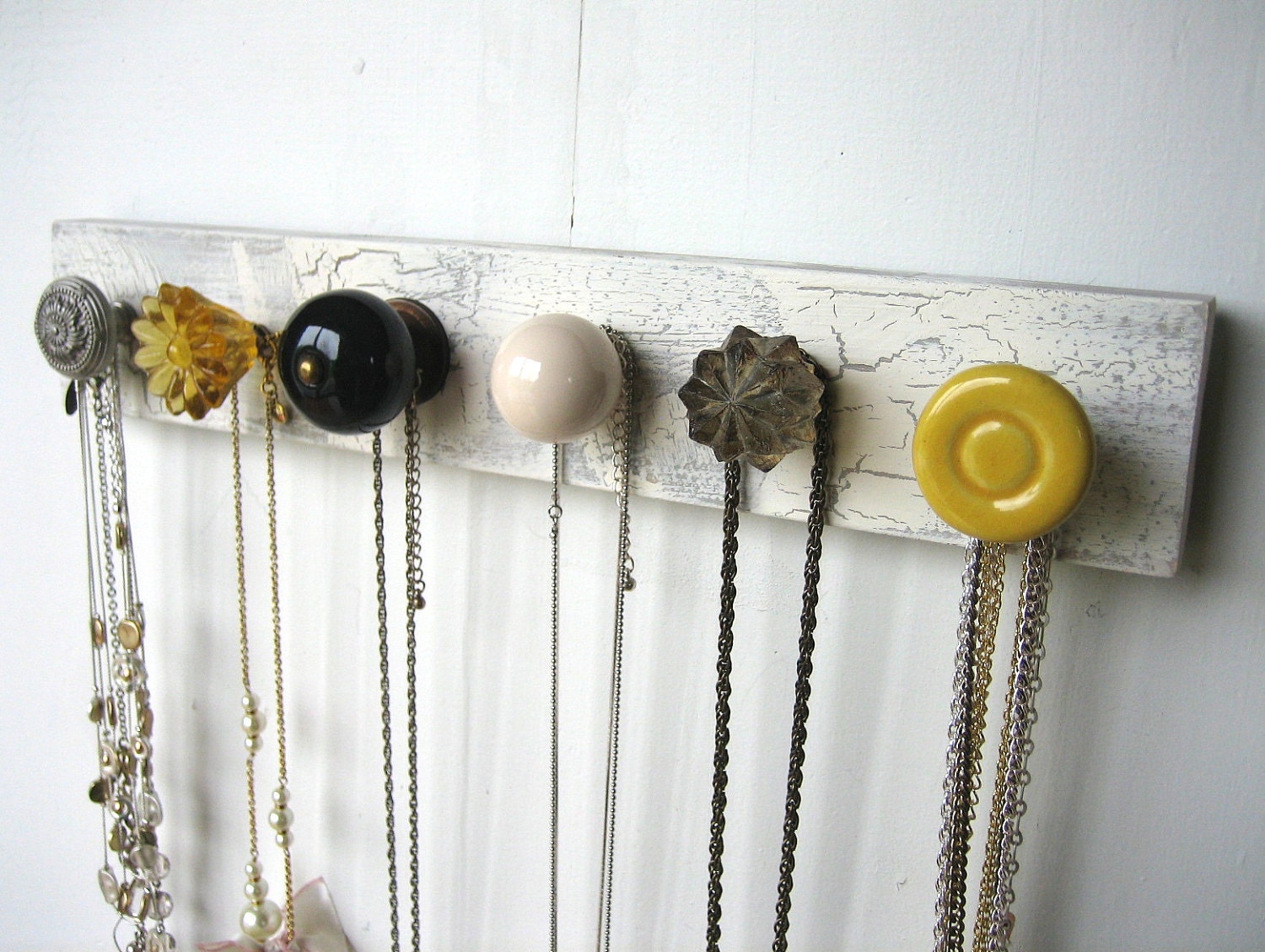 Hanging Jewelry Organizer with Yellow and Gray Knobs