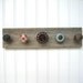 Necklace Holder with Red Valve Handle