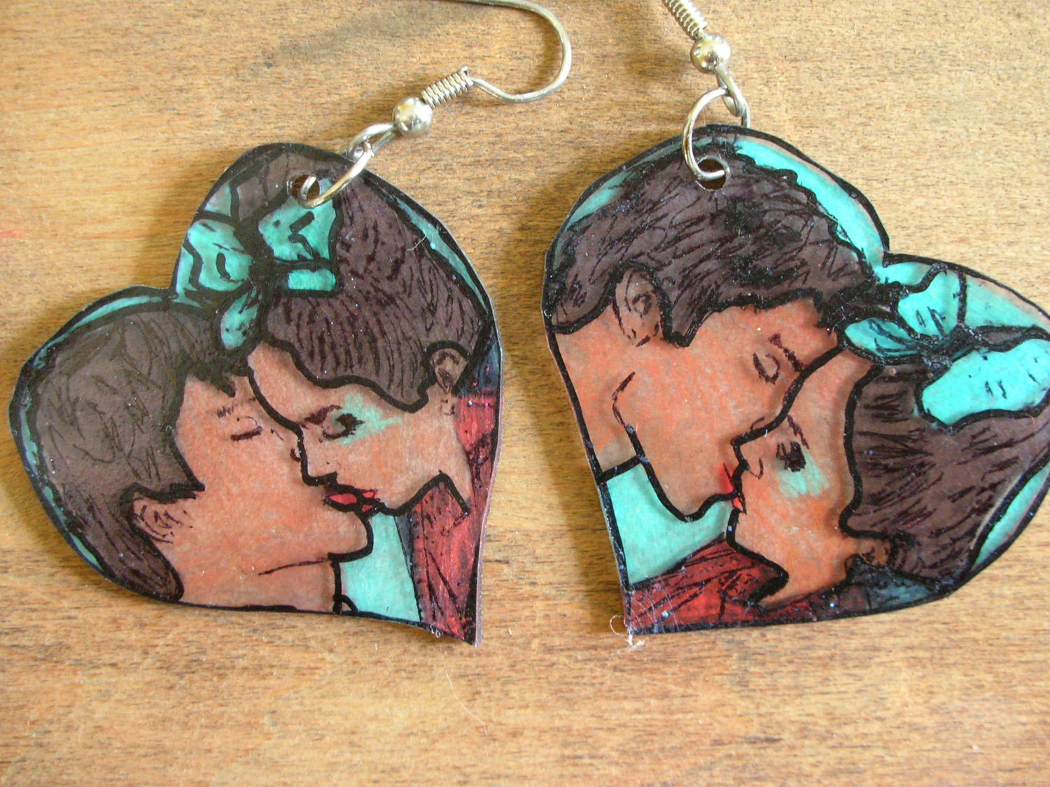 Heart shaped earrings. Handmade. Romantic Couple. Fish hook. Dangle. Silver.  Girly.  girl with bow. Teal and peach colored. 