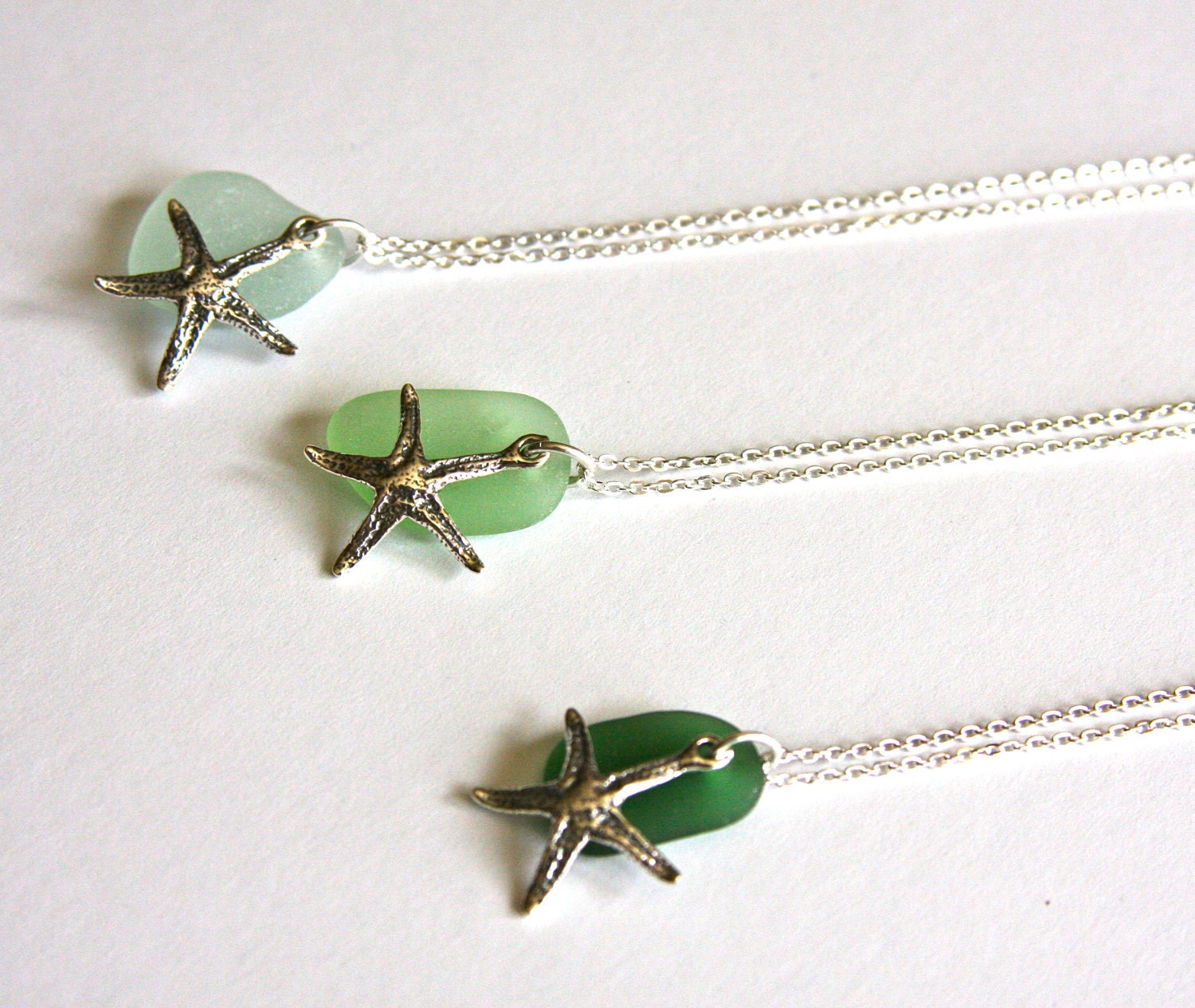 Sterling silver necklace with sea glass and sterling silver star fish charm