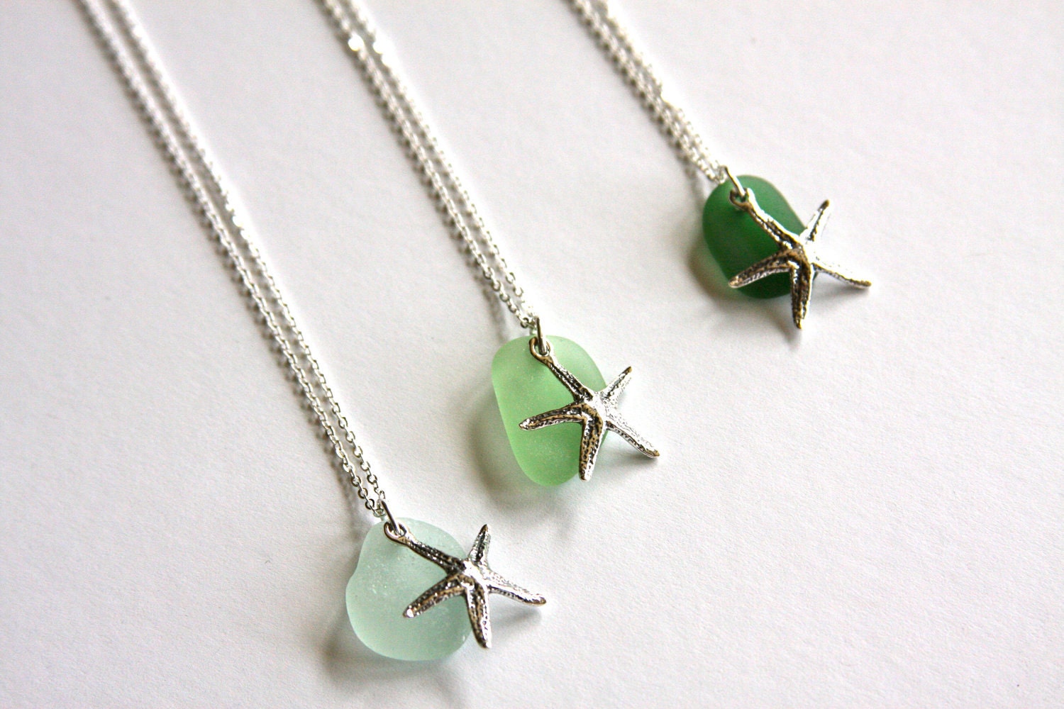 Sterling silver necklace with sea glass and sterling silver star fish charm