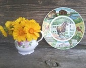 Mid-century kitsch state plate of Kentucky-kitsch Kentucky souvenir plate