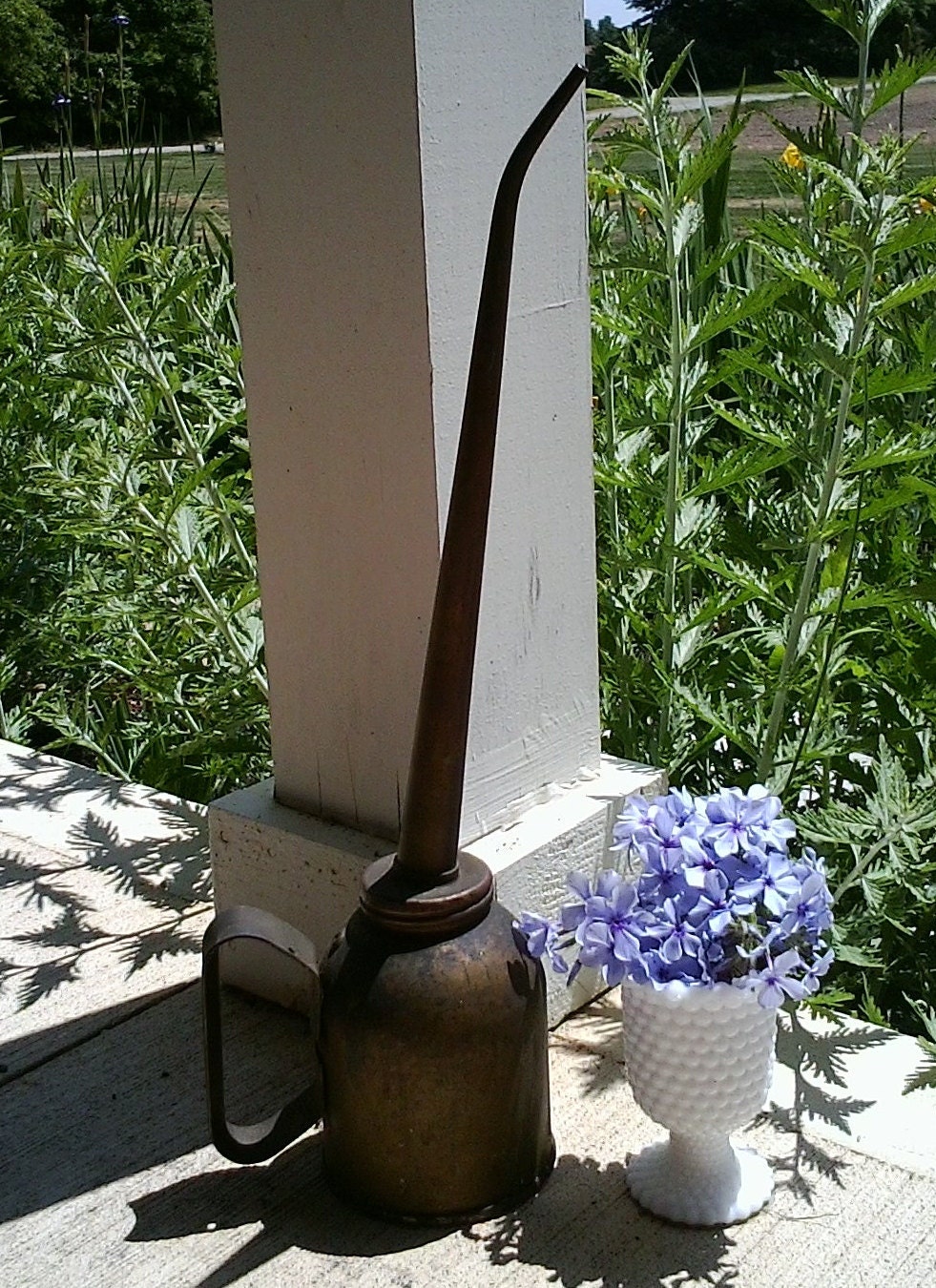 Industrial mid-century distressed metal oil can