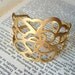 Beautiful Cuff-bracelet, with unique cut-out design (gold plated 24K)
