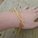 Square bangle bracelets in gold, gold square bangle bracelets, bangle bracelets