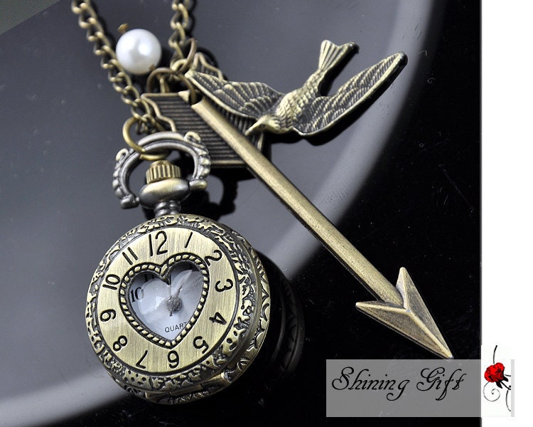 Hunger Games, Inspired Arrow,Bird, Mockingjay and Peeta Pearl Roman numerals Pocket watch Locket Necklace