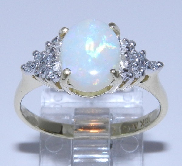 Estate Vintage Yellow Gold Diamond and Oval 9 X 7 mm Opal Ring