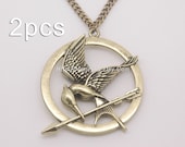 Hot Sale---2PCS The Hunger Games Necklace Pendant, Inspired Mockingjay Necklace With Arrow in Antique Bronze - Double Sided