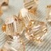 12 LIGHT PEACH Crystalized Austrian SWAROVSKI Crystals 5328 Xilion Faceted Bicone 6mm, Jewelry Supplies - beadconet 1068