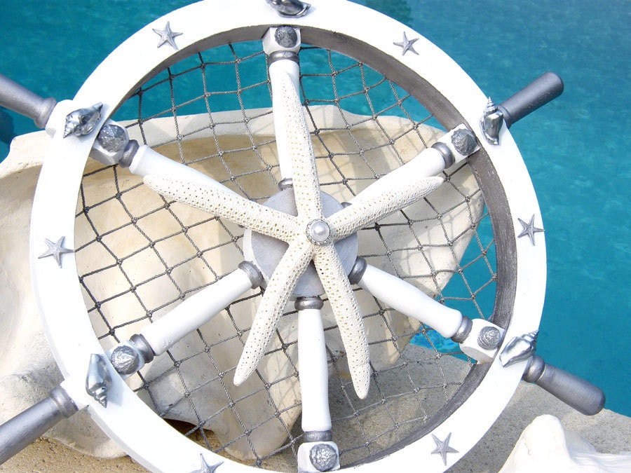 Silver Leaf, Wooden Ships Wheel with Starfish, Seashells, Nettings, Pearl and Crystals.