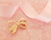 Vintage Gold Tone Ribbon Brooch with Rhinestones