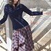 Sun-flared tartan maternity skirt. Black-red check.