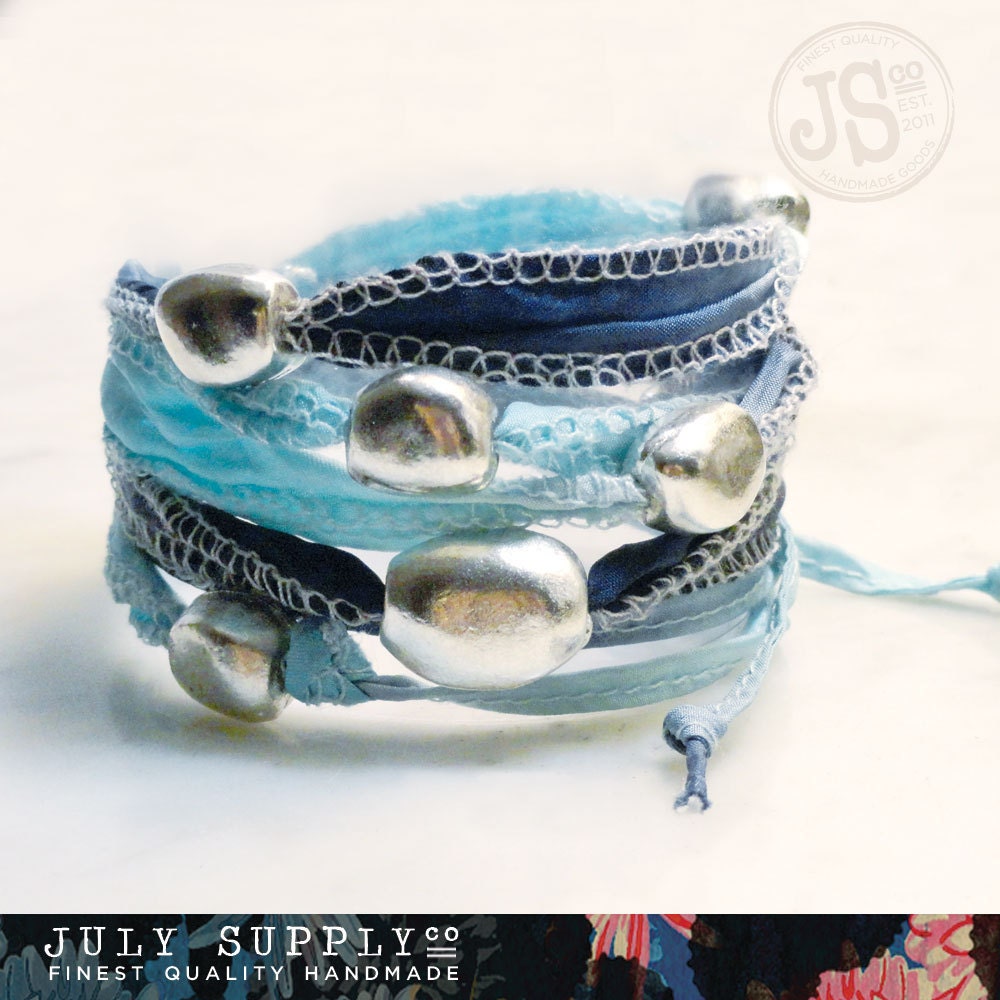 silk wrap bracelet: turquoise hand dyed silk, silver stone beads. gift boxed.