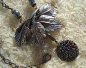 Assemblage Necklace, antique button, vintage buckle, antiqued chain