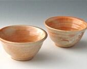 two small bowls, orange shino stoneware