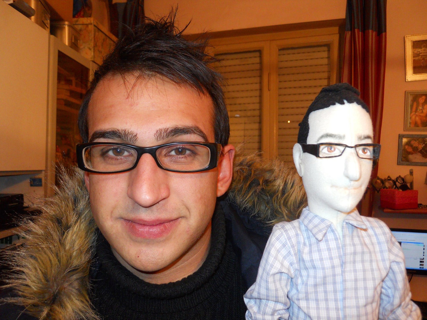 A couple of portrait dolls in cloth.