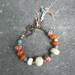 ALU good luck runic inscription amulet bracelet orange
