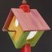 Birdhouse lamp. Night light. Rustic. Folk art. Green, yellow, purple and red. Natural log base. Paper lace windows. 133