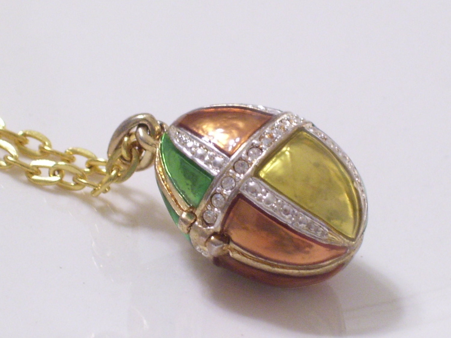 Vintage Faberge Style Goldtone Egg Locket Pendant Necklace, Rhinestone Copper Green Gold and Purple Enamel