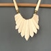 Tribal Bone Bib Necklace . Tailfeathers . Carved .