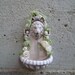 Dollhouse miniature lion fountain with white roses