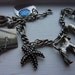 RESERVED For My dear Friend PAT 1940s Sterling silver bracelet loaded with charms guilloche articulated charm