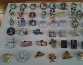 Assortment of enamel and metal Disney Trader pins for crafting. Lot of 50