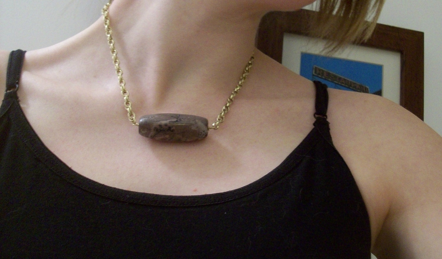 Oval bead necklace on a gold-tone chain
