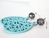 Turquoise Tear Drop Dangles With Gun Metal Bead