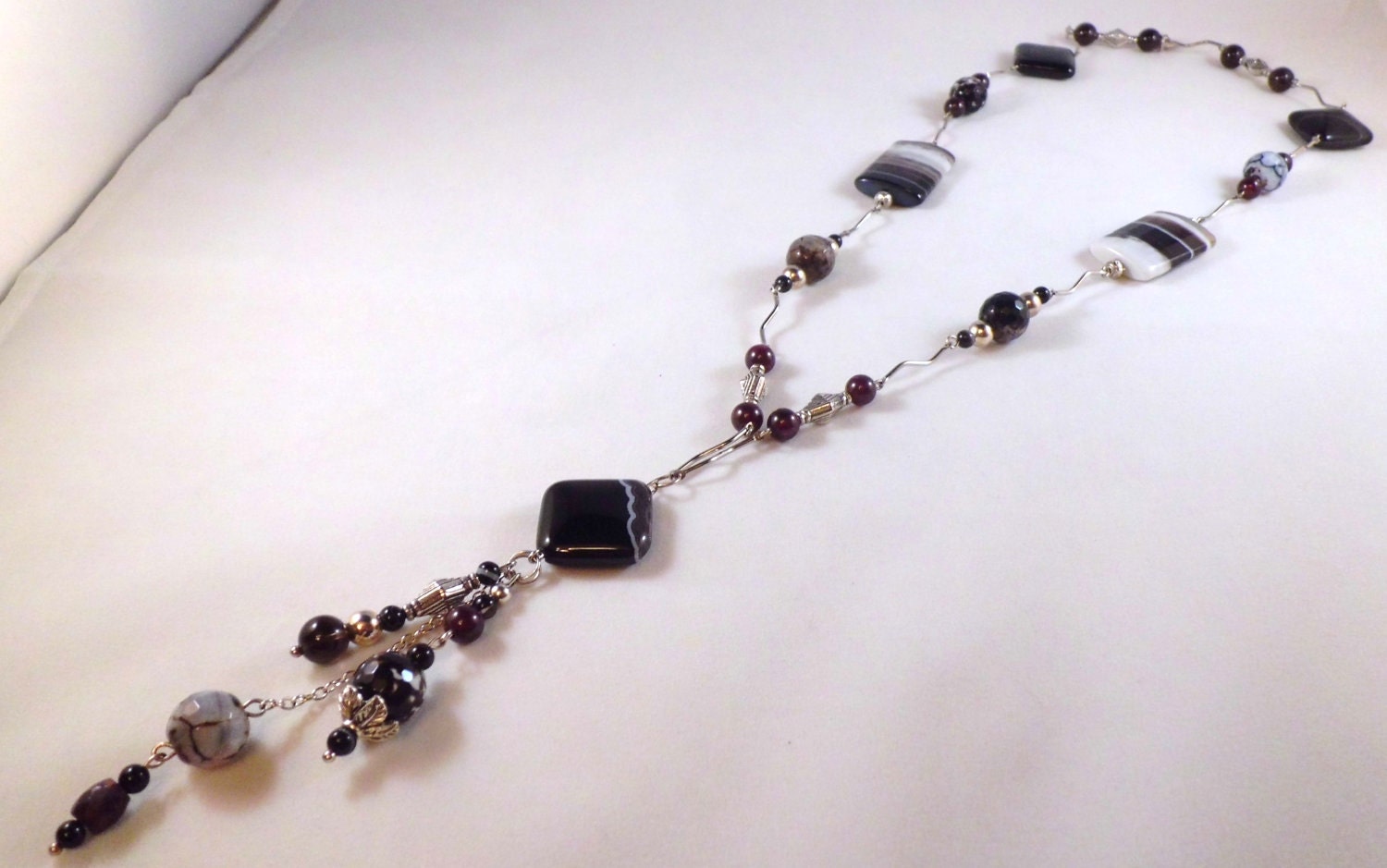 Botswana agate,garnet, and snake skin agate hand linked necklace